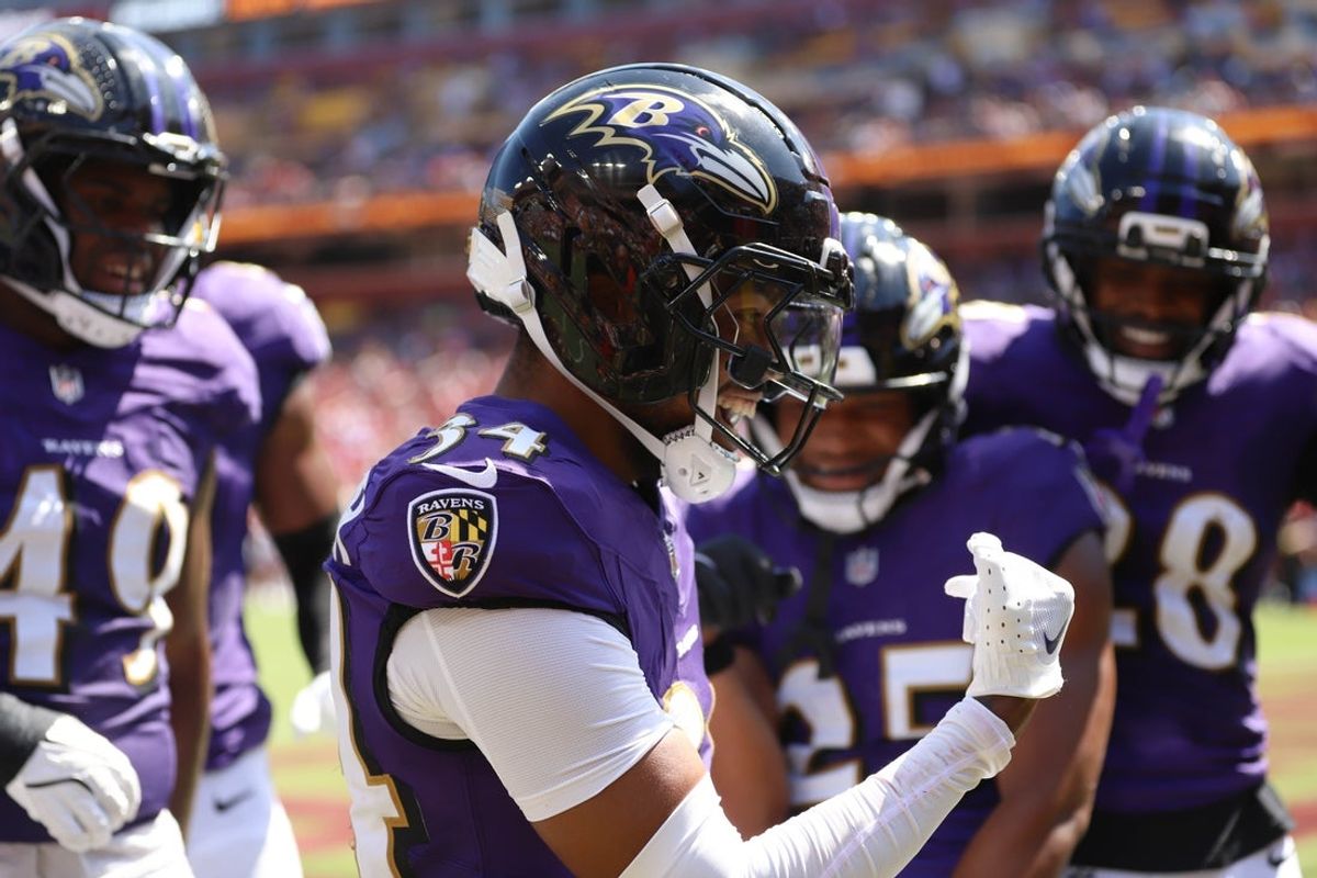 Aug 23, 2025; Landover, Maryland, USA; Baltimore Ravens cornerback Thomas Graham Jr. (34) celebrates after scoring a touchdown against the Washington Commanders in the fourth quarter at Northwest Stadium. Mandatory Credit: Jordyn Harris-Imagn Images