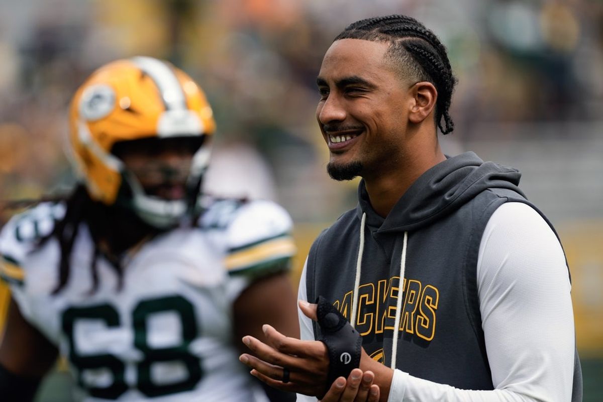 Aug 23, 2025; Green Bay, Wisconsin, USA;  Green Bay Packers quarterback Jordan Love (10) looks on during warmups prior to the game against the Seattle Seahawks at Lambeau Field. Mandatory Credit: Jeff Hanisch-Imagn Images