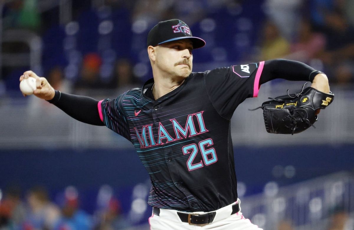 Aug 23, 2025; Miami, Florida, USA; Miami Marlins starting pitcher Janson Junk (26) pitches during the first inning against the Toronto Blue Jays at loanDepot Park. Mandatory Credit: Rhona Wise-Imagn Images