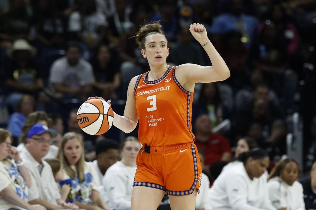 Aug 23, 2025; Chicago, Illinois, USA; Connecticut Sun guard Marina Mabrey (3) brings the ball up court against the Chicago Sky during the first half at Wintrust Arena. Mandatory Credit: Kamil Krzaczynski-Imagn Images