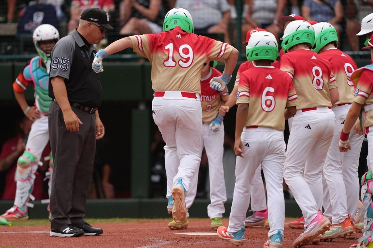 Aug 23, 2025; Williamsport, PA, USA; Garrett Gallegos (19) of Mountain Region celebrates with teammates after hitting a home run against Metro Region in the fourth inning at Howard J. Lamade Stadium. Mandatory Credit: Kyle Ross-Imagn Images