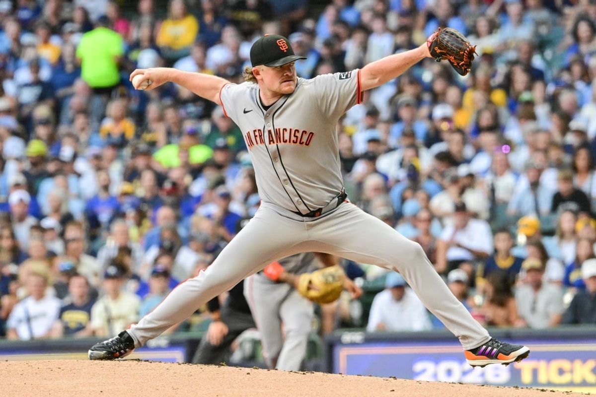 Aug 23, 2025; Milwaukee, Wisconsin, USA; San Francisco Giants starting pitcher Logan Webb (62) throws a pitch in the first inning against the Milwaukee Brewers at American Family Field. Mandatory Credit: Benny Sieu-Imagn Images