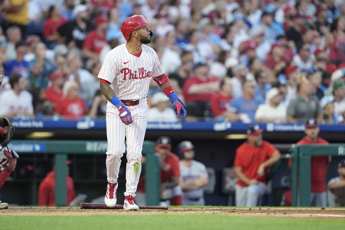 Aug 23, 2025; Philadelphia, Pennsylvania, USA; Philadelphia Phillies second baseman Edmundo Sosa (33) watches his three-run home run against the Washington Nationals during the fourth inning at Citizens Bank Park. Mandatory Credit: Gregory Fisher-Imagn Images
