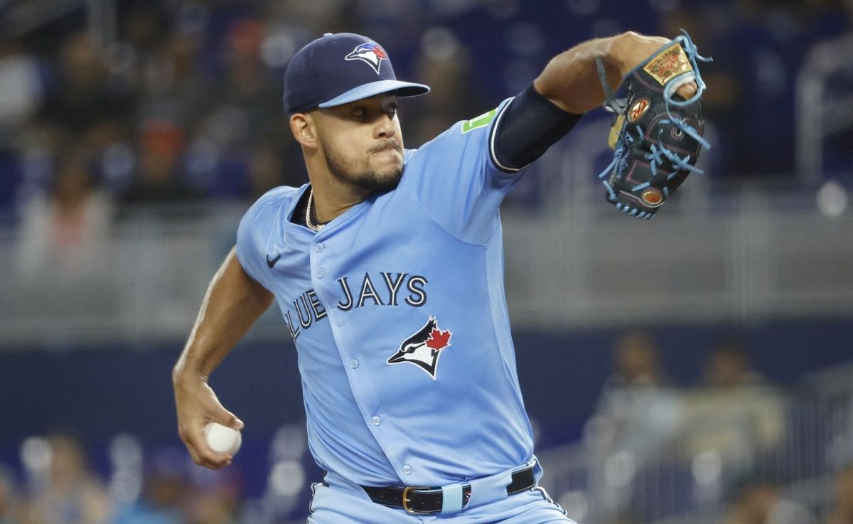 Aug 23, 2025; Miami, Florida, USA;  Toronto Blue Jays starting pitcher Jose Berrios (17) pitches against the Miami Marlins during the first inning at loanDepot Park. Mandatory Credit: Rhona Wise-Imagn Images