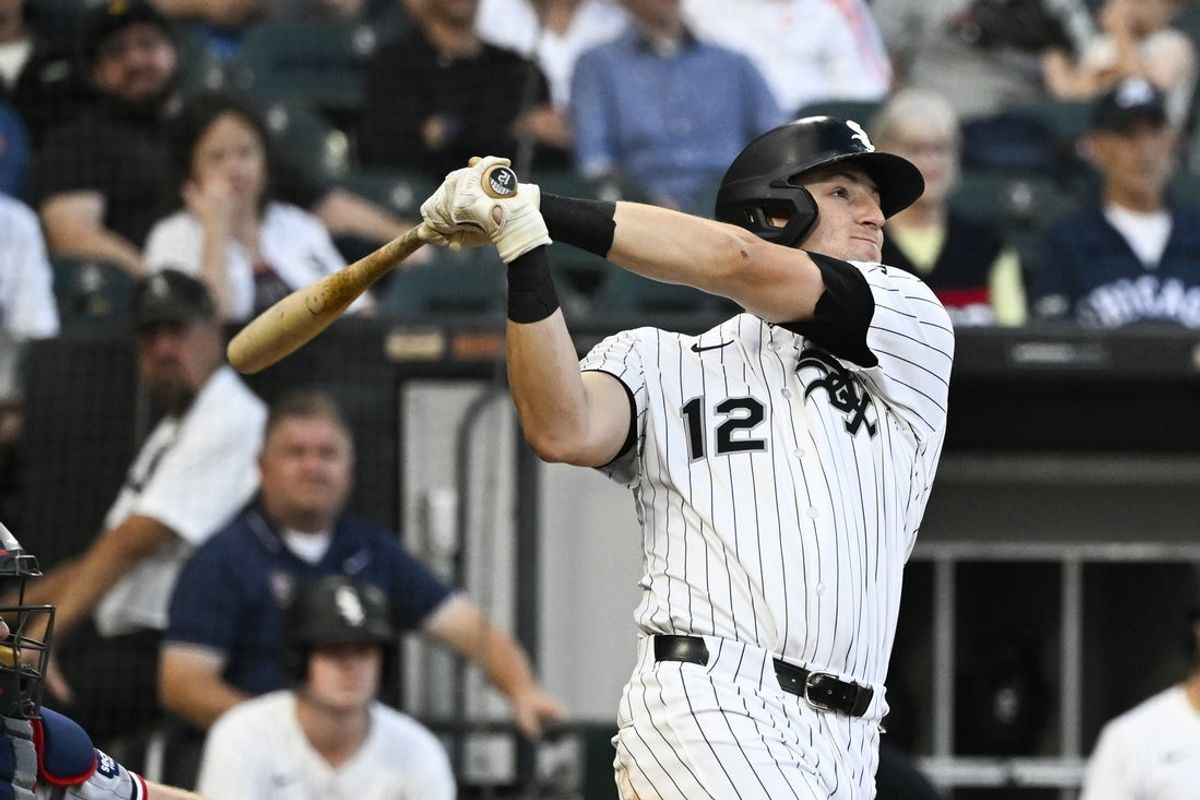 Aug 23, 2025; Chicago, Illinois, USA;  Chicago White Sox shortstop Colson Montgomery (12) hits a grand slam against the Minnesota Twins during the second inning at Rate Field. Mandatory Credit: Matt Marton-Imagn Images