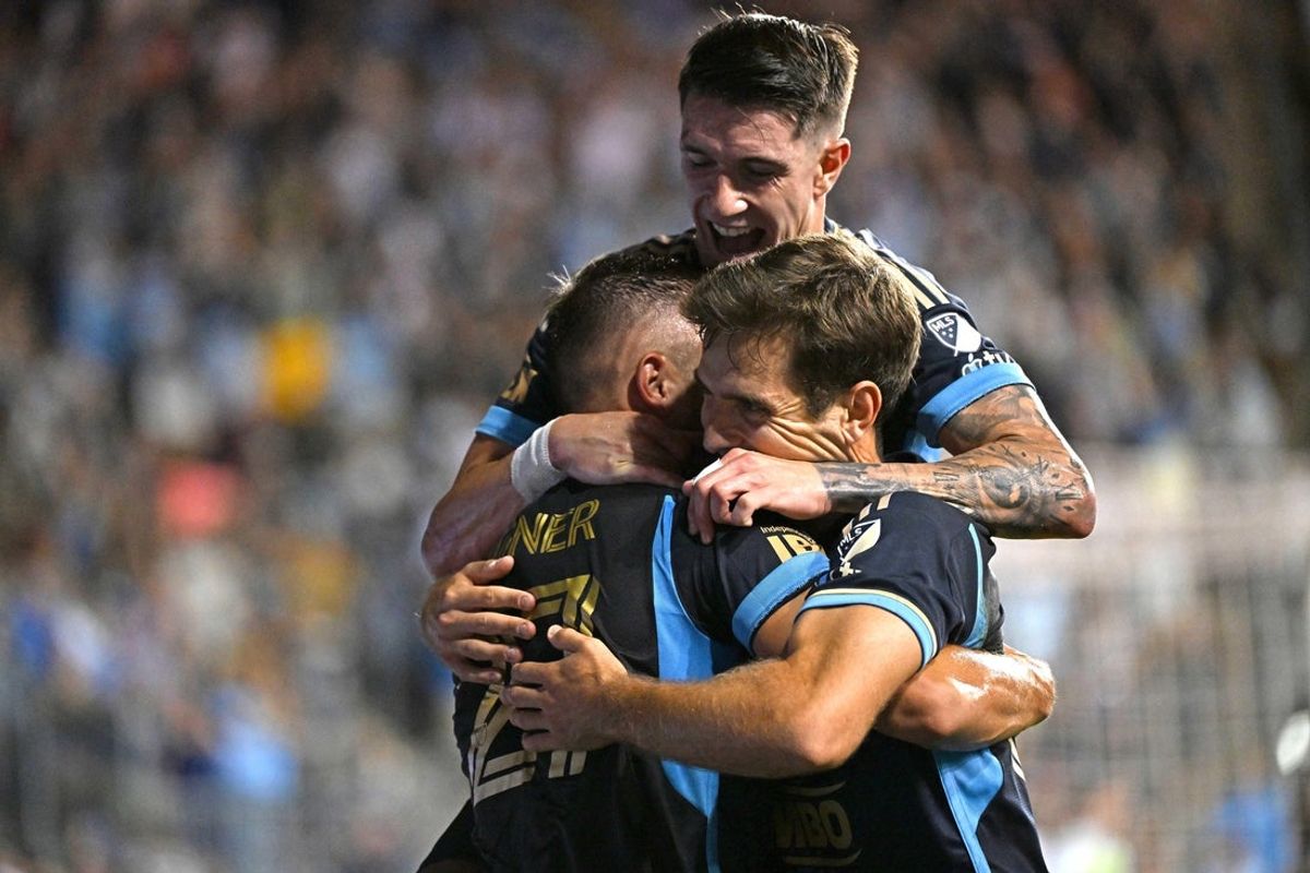 Aug 23, 2025; Chester, Pennsylvania, USA; Philadelphia Union defender Kai Wagner (27) celebrates his goal with teammate against the Chicago Fire during the second half at Subaru Park. Mandatory Credit: Eric Hartline-Imagn Images