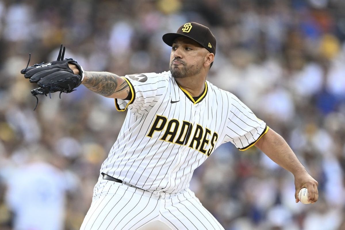 Aug 23, 2025; San Diego, California, USA; San Diego Padres starting pitcher Nestor Cortes (65) delivers during the first inning against the Los Angeles Dodgers at Petco Park. Mandatory Credit: Denis Poroy-Imagn Images