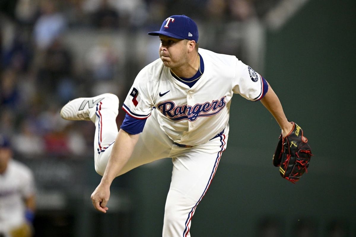 Aug 23, 2025; Arlington, Texas, USA; Texas Rangers relief pitcher Jacob Webb (71) pitches against the Cleveland Guardians during the game at Globe Life Field. Mandatory Credit: Jerome Miron-Imagn Images