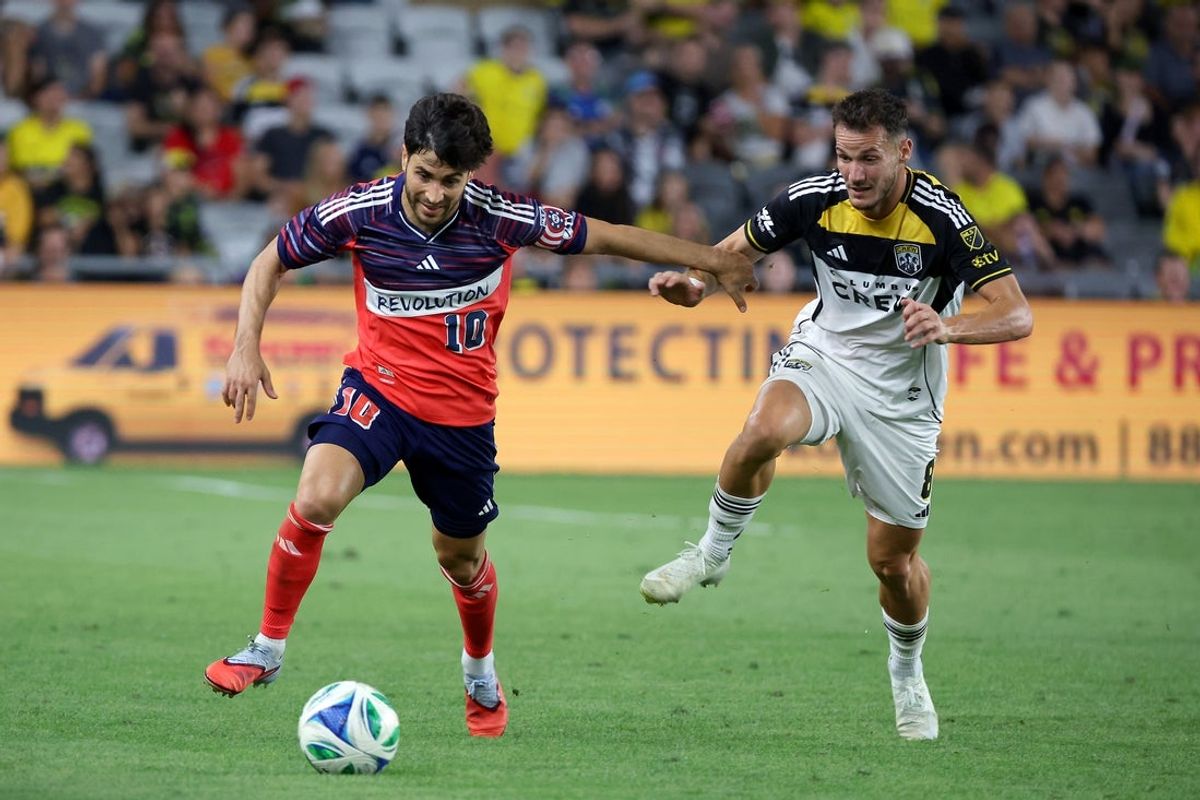 Aug 23, 2025; Columbus, Ohio, USA;  New England Revolution midfielder Carles Gil (10) fights for the ball with Columbus Crew midfielder Dániel Gazdag (8) during the second half at Lower.com Field. Mandatory Credit: Joseph Maiorana-Imagn Images