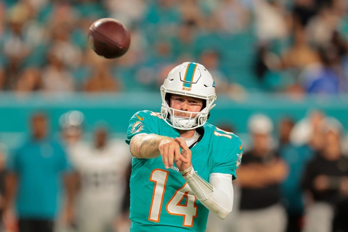 Aug 23, 2025; Miami Gardens, Florida, USA; Miami Dolphins quarterback Quinn Ewers (14) passes the football against the Jacksonville Jaguars during the fourth quarter at Hard Rock Stadium. Mandatory Credit: Sam Navarro-Imagn Images