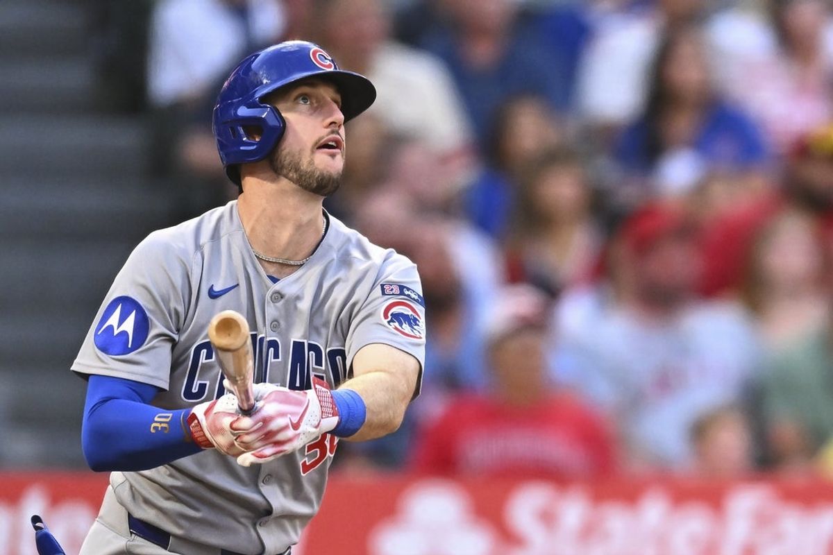 Aug 23, 2025; Anaheim, California, USA; Chicago Cubs outfielder Kyle Tucker (30) hits a two-run home run against the Los Angeles Angels during the third inning at Angel Stadium. Mandatory Credit: Jonathan Hui-Imagn Images