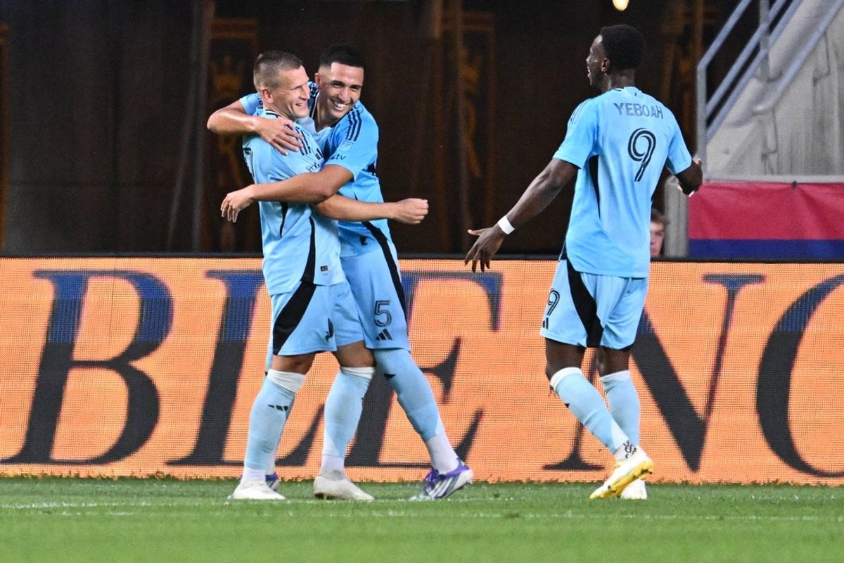 Aug 23, 2025; Sandy, Utah, USA;  Minnesota United midfielder Robin Lod (17) celebrates with defender Nicolas Romero (5) after scoring a goal in the first half against Real Salt Lake at America First Field. Mandatory Credit: Jamie Sabau-Imagn Images