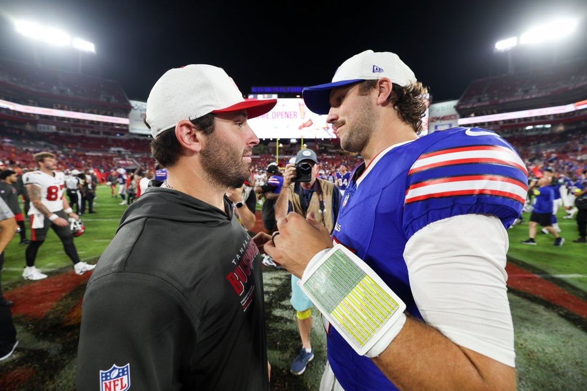Aug 23, 2025; Tampa, Florida, USA; Buffalo Bills quarterback Josh Allen (17) greets Tampa Bay Buccaneers quarterback Baker Mayfield (6) after a preseason game at Raymond James Stadium. Mandatory Credit: Nathan Ray Seebeck-Imagn Images