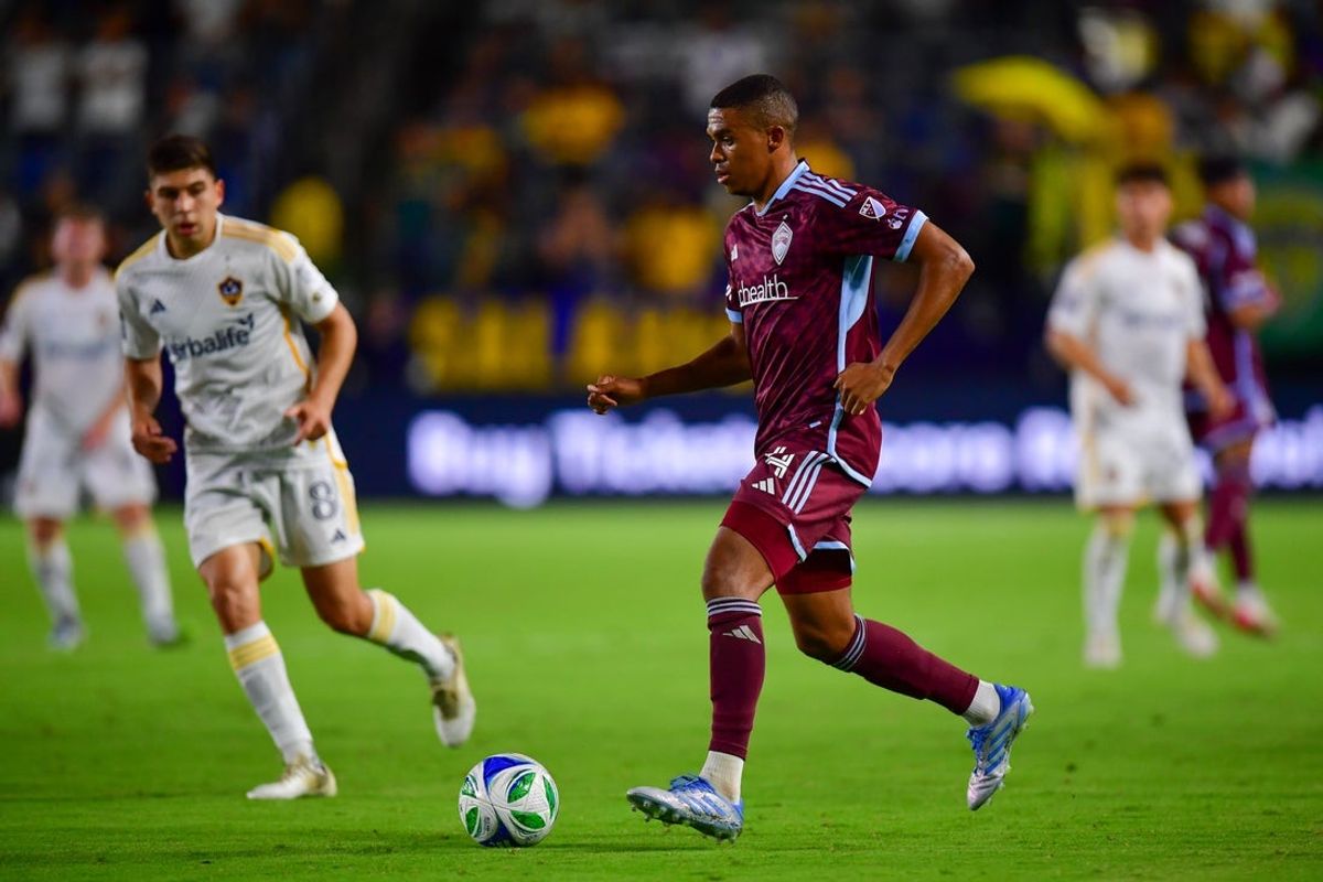 Aug 23, 2025; Carson, California, USA; Colorado Rapids defender Reggie Cannon (4) moves the ball against the LA Galaxy during the second half at Dignity Health Sports Park. Mandatory Credit: Gary A. Vasquez-Imagn Images