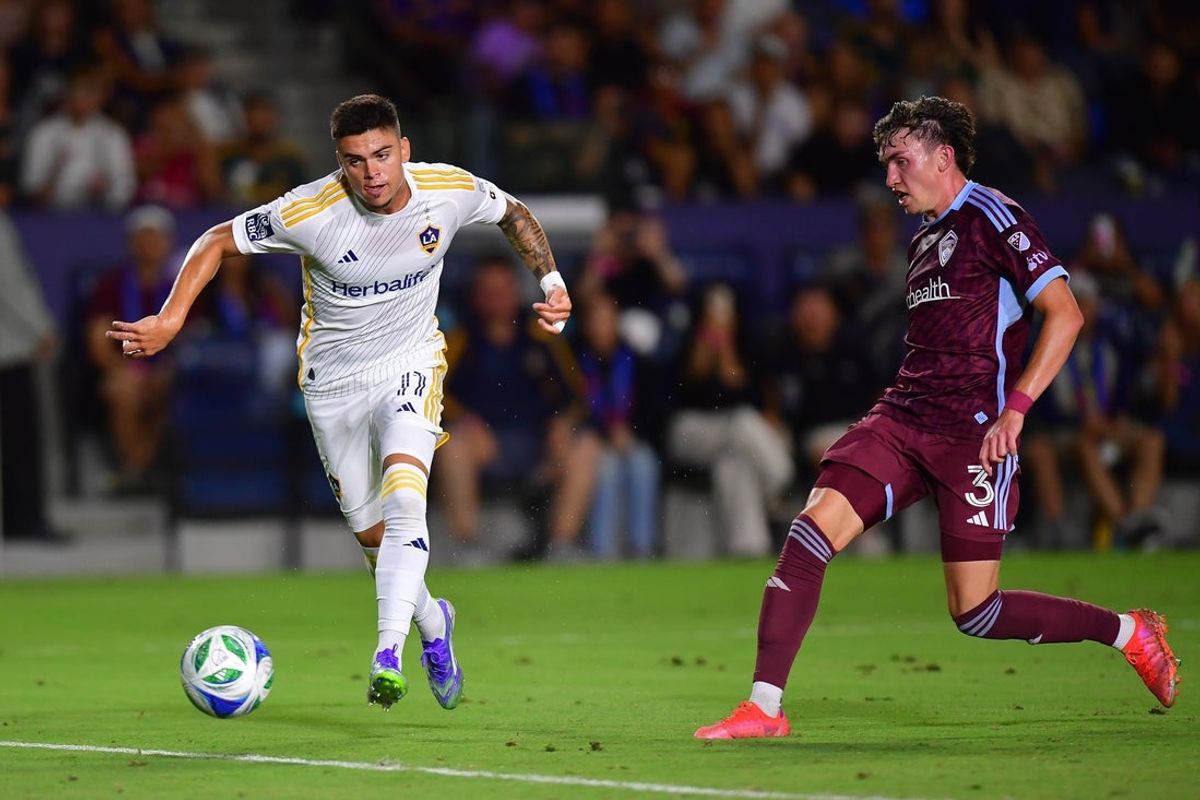 Aug 23, 2025; Carson, California, USA; LA Galaxy forward Gabriel Pec (11) moves in for a shot ahead of Colorado Rapids defender Sam Vines (3) during the second half at Dignity Health Sports Park. Mandatory Credit: Gary A. Vasquez-Imagn Images