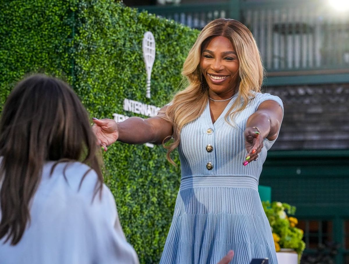 Tennis great Serena Williams welcomes inductee Maria Sharapova to the stage at the Saturday, Aug. 23 ceremony at the International Tennis Hall of Fame, Newport.