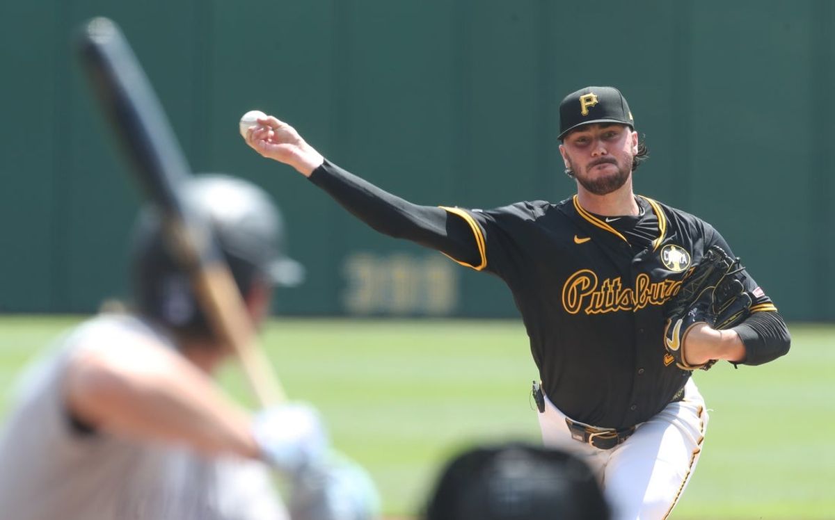 Aug 24, 2025; Pittsburgh, Pennsylvania, USA;  Pittsburgh Pirates starting pitcher Paul Skenes (30) delivers a pitch to Colorado Rockies designated hitter Hunter Goodman (15) during the first inning at PNC Park. Mandatory Credit: Charles LeClaire-Imagn Images