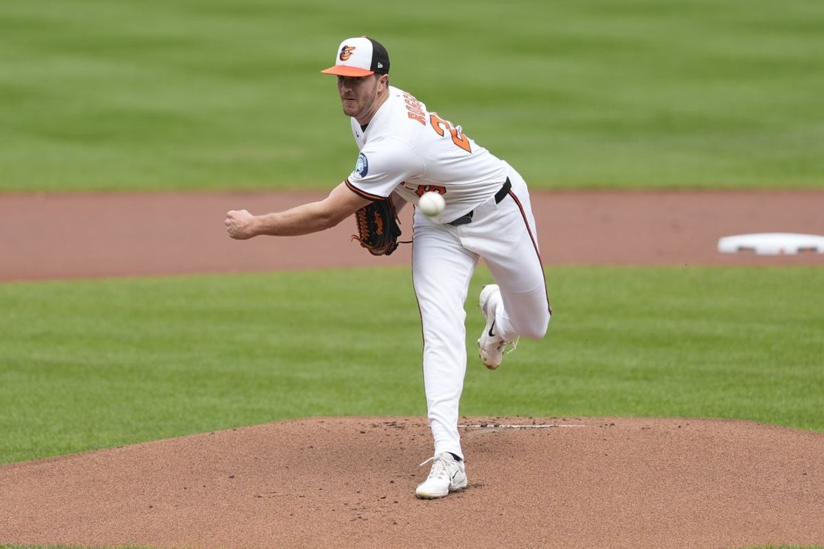 Aug 24, 2025; Baltimore, Maryland, USA; Baltimore Orioles pitcher Trevor Rogers (28) delivers a pitch against the Houston Astros during the first inning at Oriole Park at Camden Yards. Mandatory Credit: Gregory Fisher-Imagn Images