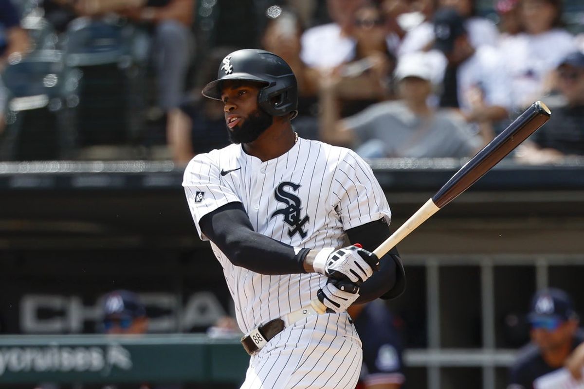 Aug 24, 2025; Chicago, Illinois, USA; Chicago White Sox center fielder Luis Robert Jr. (88) singles against the Minnesota Twins during the first inning at Rate Field. Mandatory Credit: Kamil Krzaczynski-Imagn Images