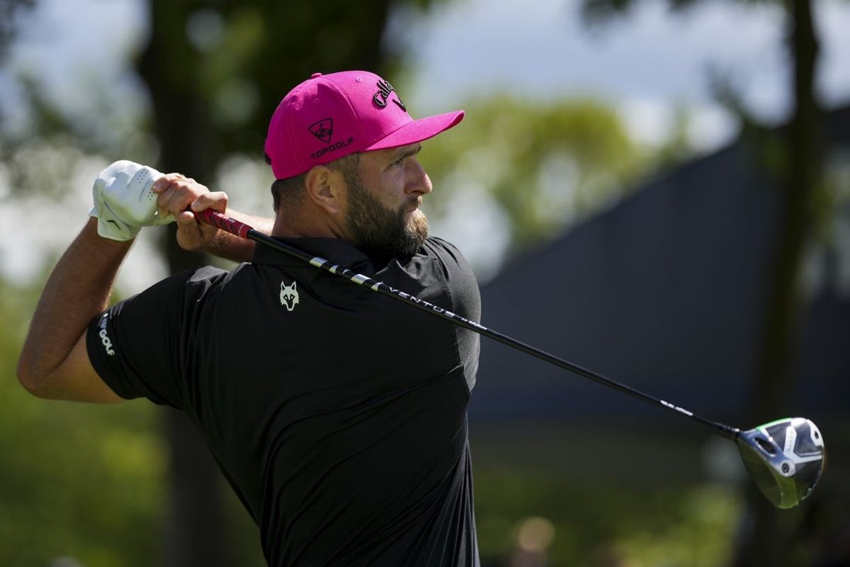 Aug 24, 2025; Detroit, Michigan, USA; Jon Rahm of Legion XIII plays his shot from the fifth tee during the finals of the LIV Golf Michigan Team Championship at The Cardinal at Saint John's Resort. Mandatory Credit: Aaron Doster-Imagn Images