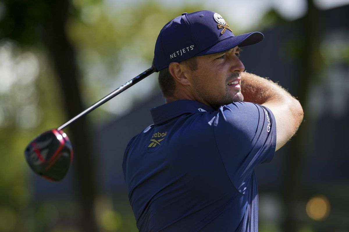 Aug 24, 2025; Detroit, Michigan, USA; Bryson DeChambeau of Crushers GC plays his shot from the fifth tee during the finals of the LIV Golf Michigan Team Championship at The Cardinal at Saint John's Resort. Mandatory Credit: Aaron Doster-Imagn Images