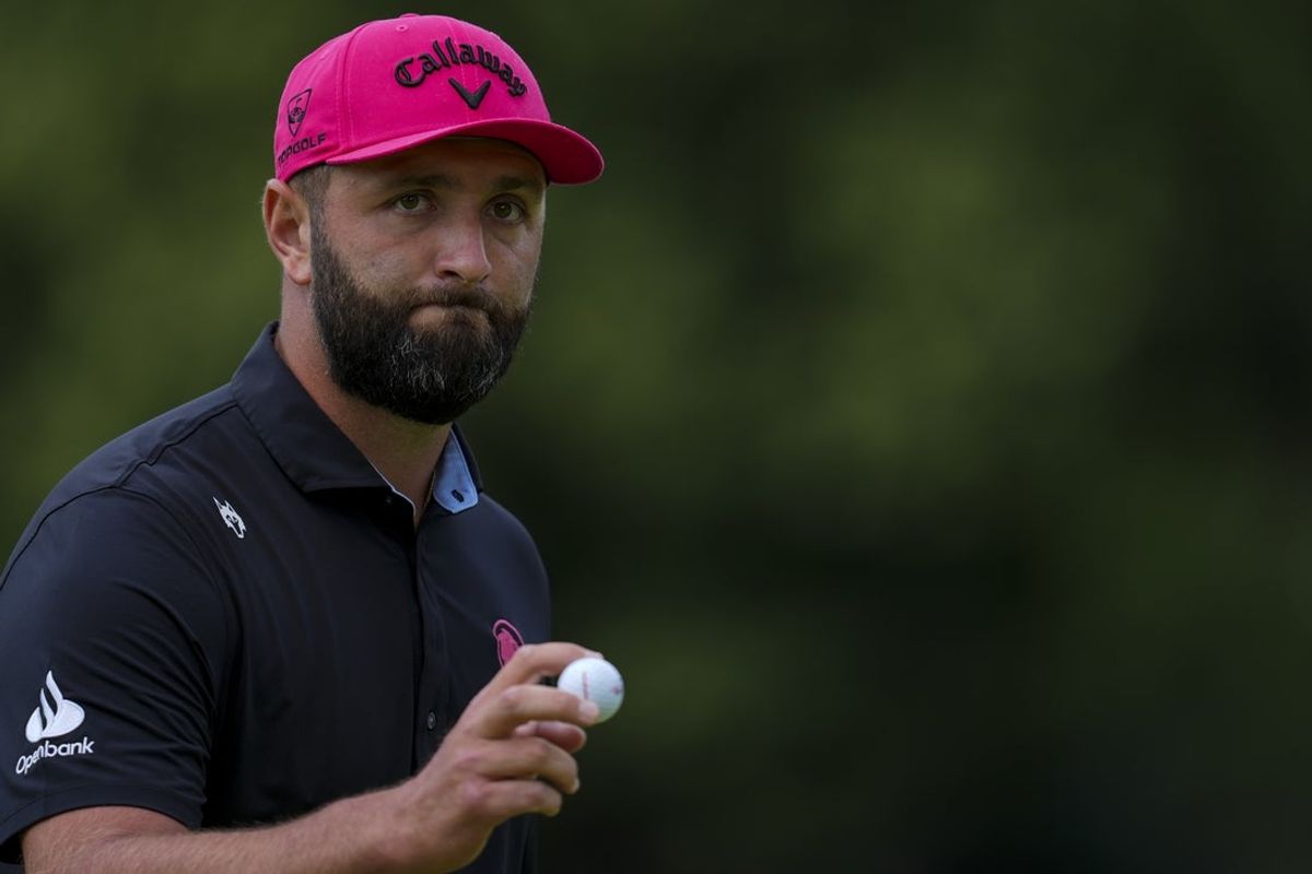 Aug 24, 2025; Detroit, Michigan, USA; Jon Rahm of Legion XIII reacts after making a putt on the first green during the finals of the LIV Golf Michigan Team Championship at The Cardinal at Saint John's Resort. Mandatory Credit: Aaron Doster-Imagn Images