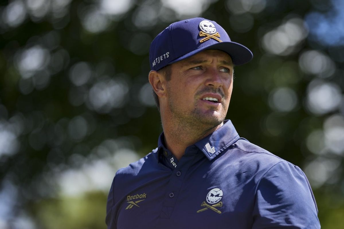Aug 24, 2025; Detroit, Michigan, USA; Bryson DeChambeau of Crushers GC plays his shot from the fifth tee during the finals of the LIV Golf Michigan Team Championship at The Cardinal at Saint John's Resort. Mandatory Credit: Aaron Doster-Imagn Images
