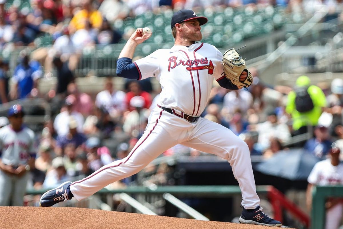 Aug 24, 2025; Cumberland, Georgia, USA; Atlanta Braves starting pitcher Bryce Elder (55) pitches the ball against the New York Mets during the first inning at Truist Park. Mandatory Credit: Jordan Godfree-Imagn Images
