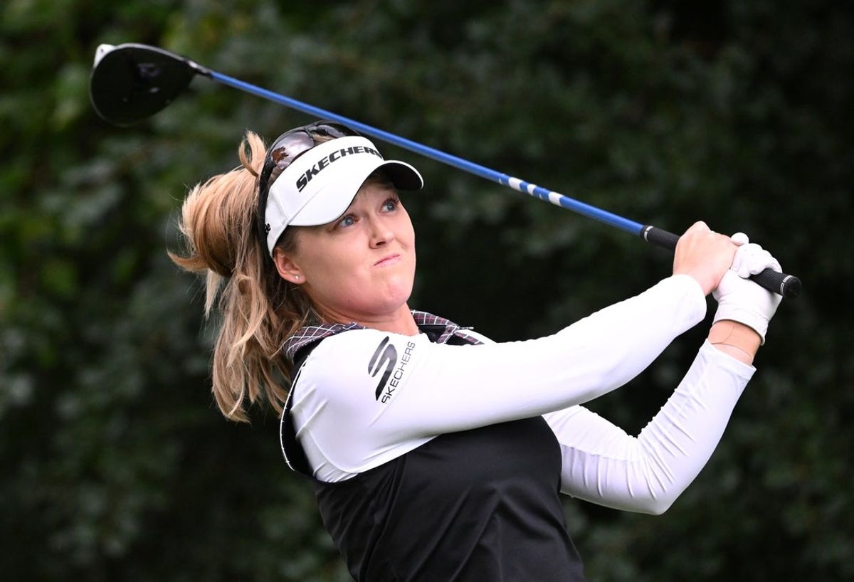 Aug 24, 2025; Mississauga, Ontario, CAN;  Brooke Henderson hits her tee shot at the fifth hole during the final round of the CPKC Women's Open golf tournament. Mandatory Credit: Dan Hamilton-Imagn Images