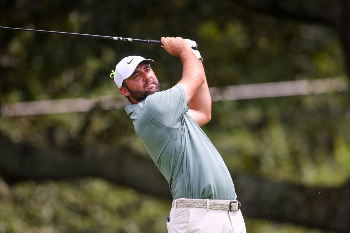 Aug 24, 2025; Atlanta, Georgia, USA; Scottie Scheffler plays his shot from the third tee during the final round of the TOUR Championship golf tournament. Mandatory Credit: Brett Davis-Imagn Images