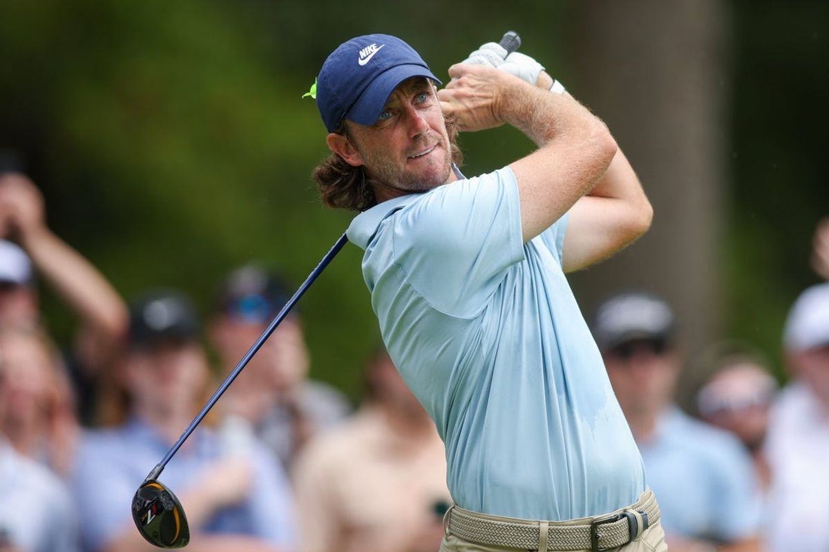 Aug 24, 2025; Atlanta, Georgia, USA; Tommy Fleetwood plays his shot from the fifth tee during the final round of the TOUR Championship golf tournament. Mandatory Credit: Brett Davis-Imagn Images