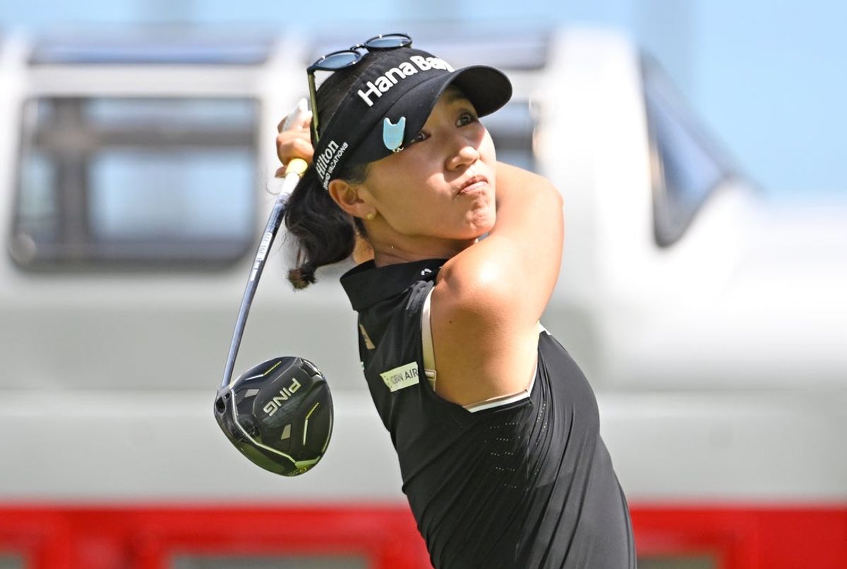 Aug 24, 2025; Mississauga, Ontario, CAN;  Lydia Ko hits her tee shot at the first hole during the final round of the CPKC Women's Open golf tournament. Mandatory Credit: Dan Hamilton-Imagn Images