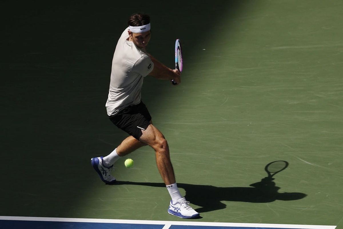 Aug 24, 2025; Flushing, NY, USA; Taylor Fritz (USA) hits a backhand against Emilio Nava (USA)(not pictured) on day one of the US Open at Louis Armstrong Stadium. Mandatory Credit: Geoff Burke-Imagn Images