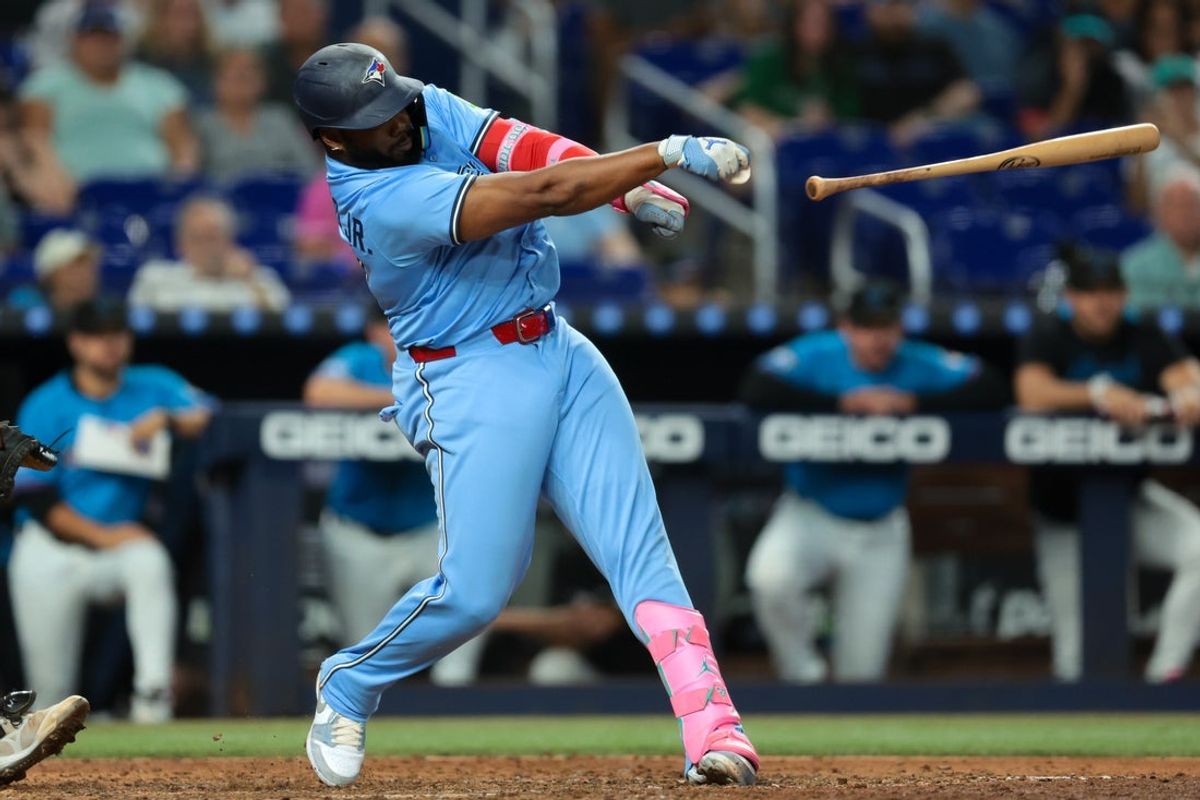 Aug 24, 2025; Miami, Florida, USA; Toronto Blue Jays first baseman Vladimir Guerrero Jr. (27) drops his bat against the Miami Marlins during the eighth inning at loanDepot Park. Mandatory Credit: Sam Navarro-Imagn Images