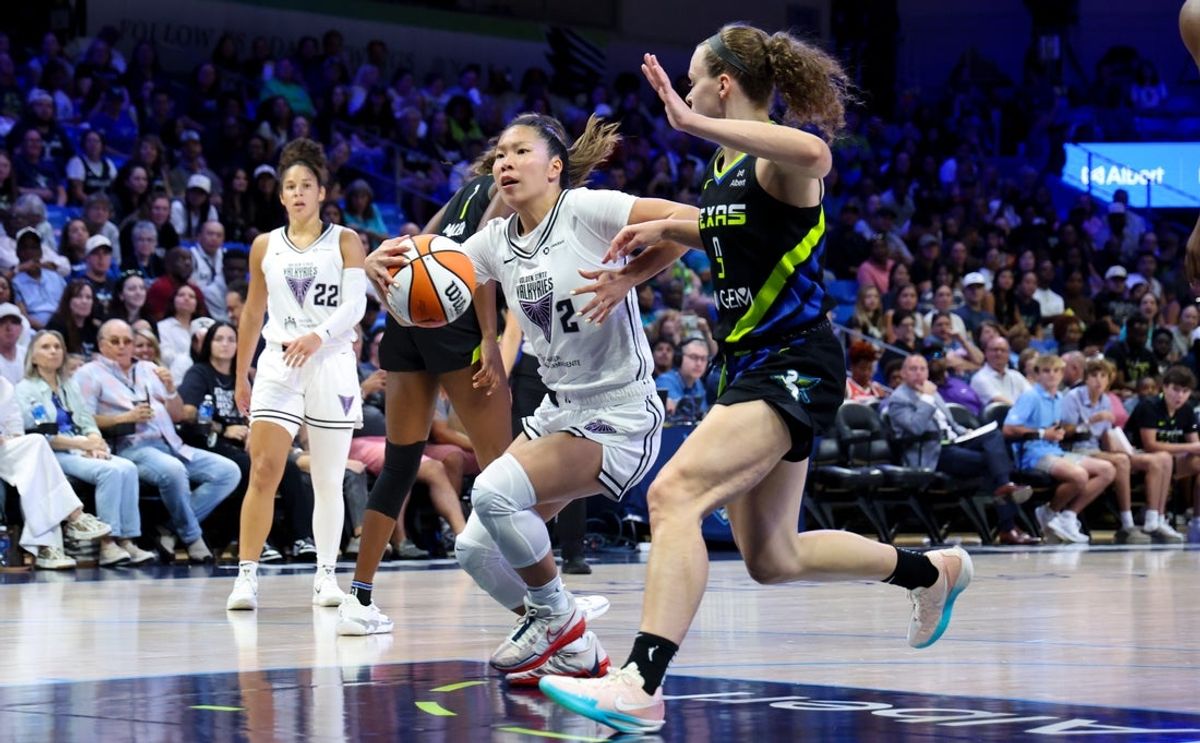 Aug 24, 2025; Arlington, Texas, USA; Golden State Valkyries guard Kaitlyn Chen (2) drives to the basket as Dallas Wings guard Grace Berger (9) defends during the first half at College Park Center. Mandatory Credit: Kevin Jairaj-Imagn Images