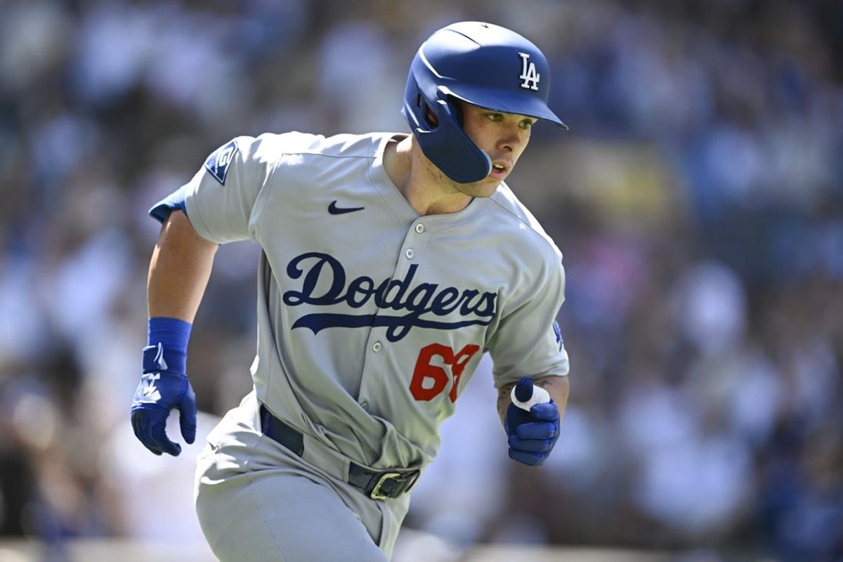 Aug 24, 2025; San Diego, California, USA; Los Angeles Dodgers catcher Dalton Rushing (68) rounds the bases after hitting a three-run home run during the seventh inning against the San Diego Padres at Petco Park. Mandatory Credit: Denis Poroy-Imagn Images