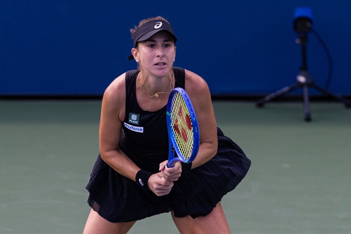 Aug 24, 2025; Flushing, NY, USA; Belinda Bencic of Switzerland in action against Zhang Shuai of China in the first round of the women’s singles at the US Open at Billie Jean King National Tennis Centre. Mandatory Credit: Mike Frey-Imagn Images