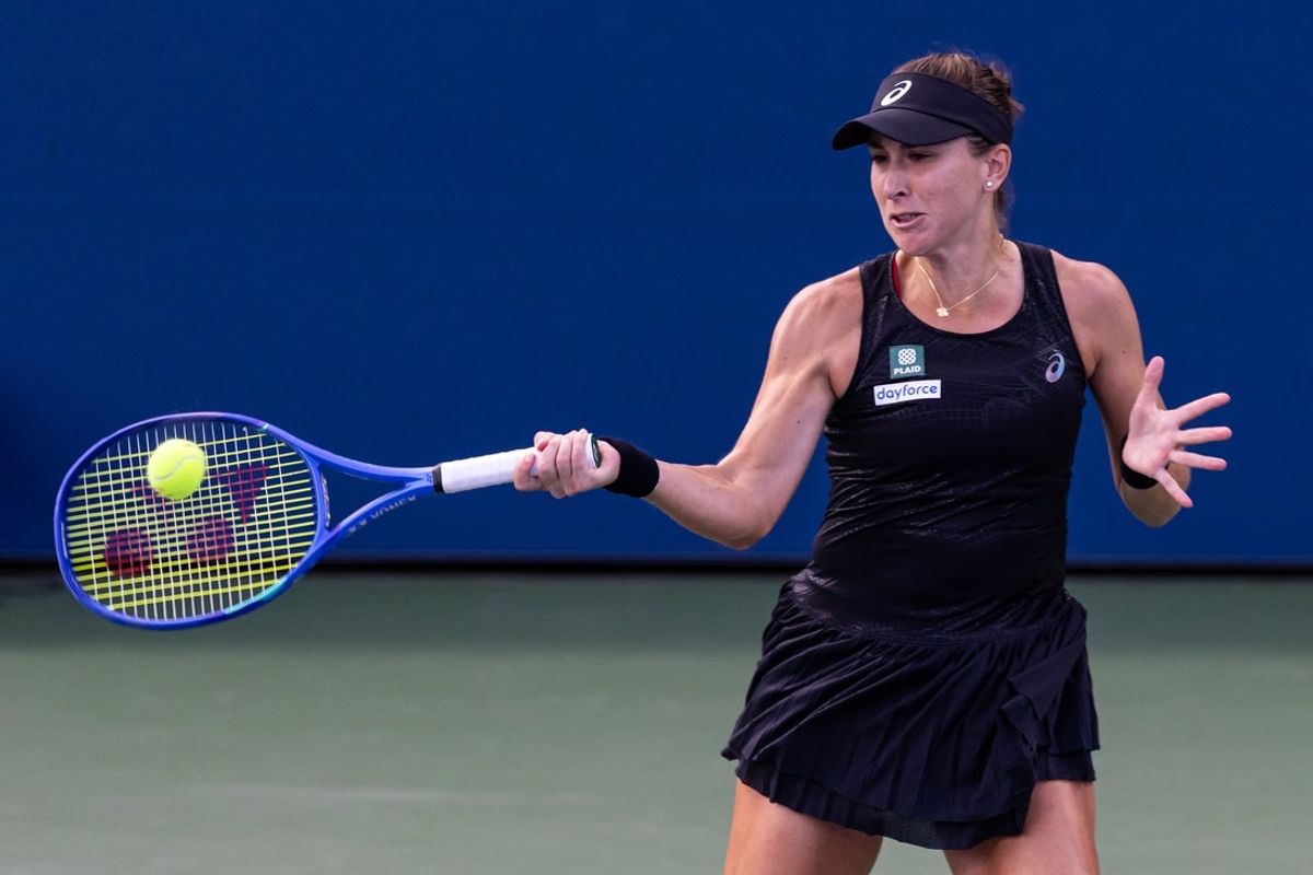 Aug 24, 2025; Flushing, NY, USA; Belinda Bencic of Switzerland in action against Zhang Shuai of China in the first round of the women’s singles at the US Open at Billie Jean King National Tennis Centre. Mandatory Credit: Mike Frey-Imagn Images