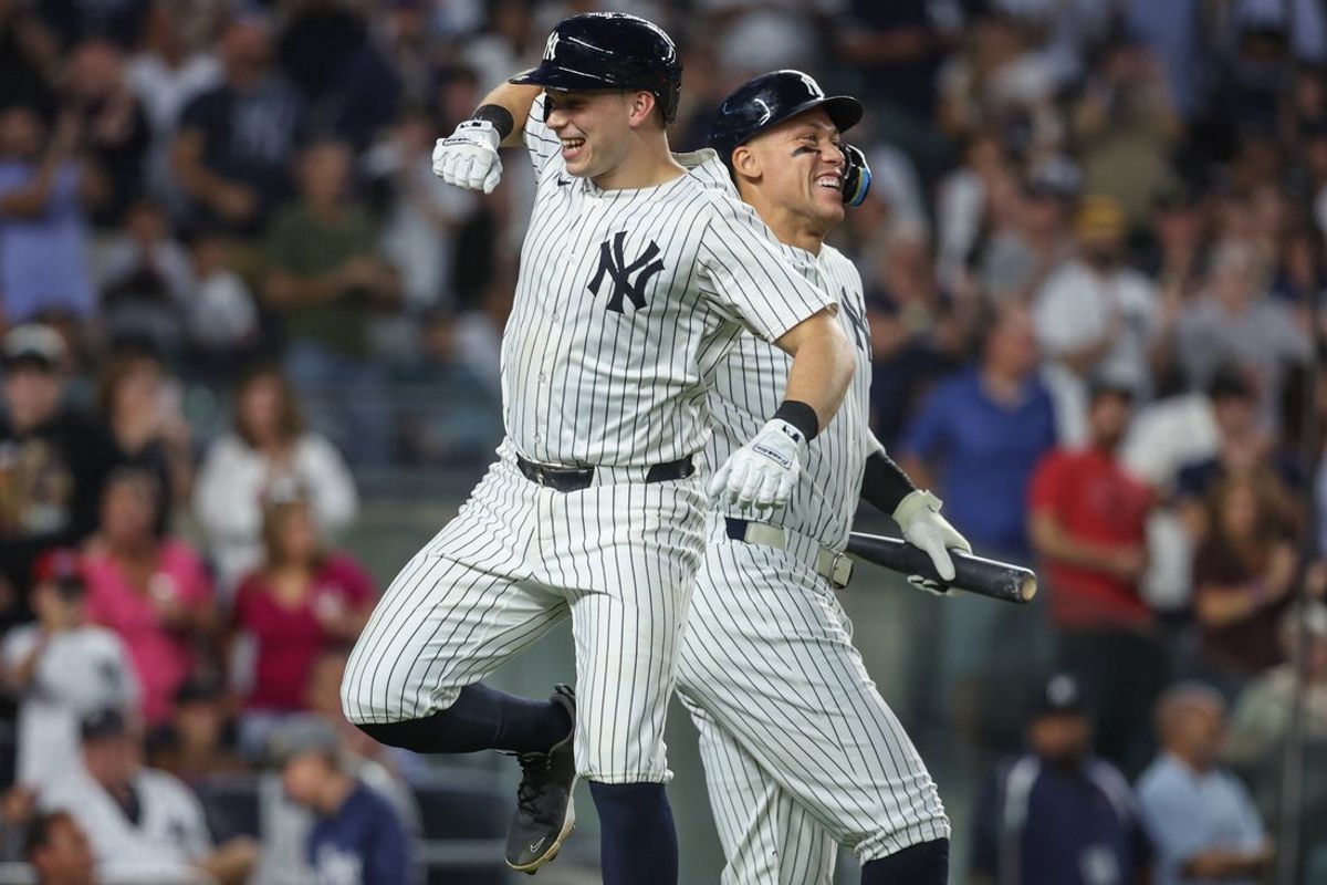 Aug 25, 2025; Bronx, New York, USA;  New York Yankees catcher Ben Rice (22) celebrates with designated hitter Aaron Judge (99) after hitting a solo home run in the third inning against the Washington Nationals at Yankee Stadium. Mandatory Credit: Wendell Cruz-Imagn Images