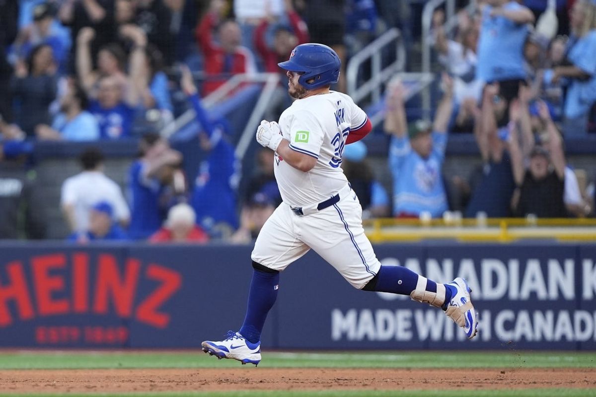 Aug 25, 2025; Toronto, Ontario, CAN; Toronto Blue Jays catcher Alejandro Kirk (30) rounds the bases on his two run home run against the Minnesota Twins during the first inning at Rogers Centre. Mandatory Credit: John E. Sokolowski-Imagn Images