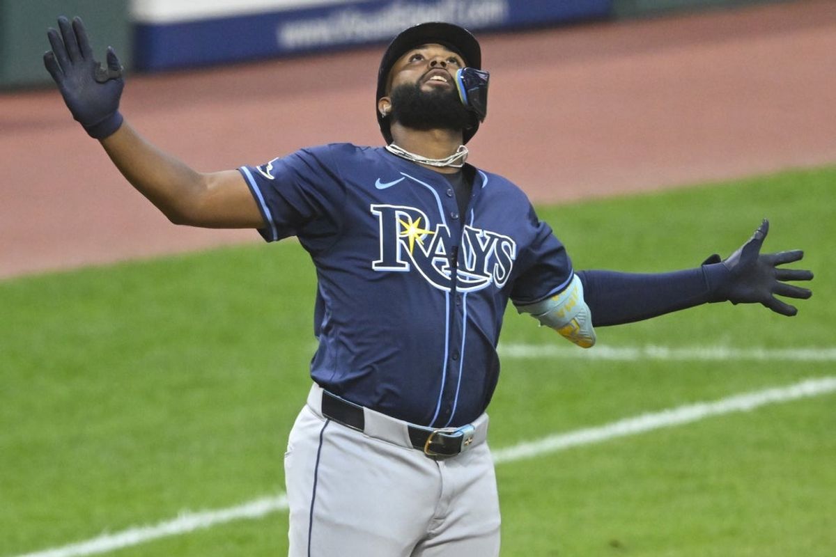 Aug 25, 2025; Cleveland, Ohio, USA; Tampa Bay Rays third baseman Junior Caminero (13) celebrates his two-run home run in the fifth inning against the Cleveland Guardians at Progressive Field. Mandatory Credit: David Richard-Imagn Images