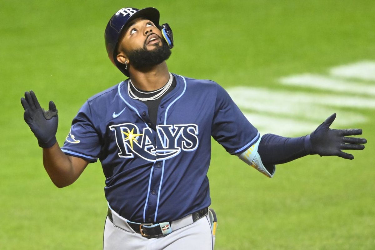 Aug 25, 2025; Cleveland, Ohio, USA; Tampa Bay Rays third baseman Junior Caminero (13) celebrates his solo home run in the seventh inning against the Cleveland Guardians at Progressive Field. Mandatory Credit: David Richard-Imagn Images