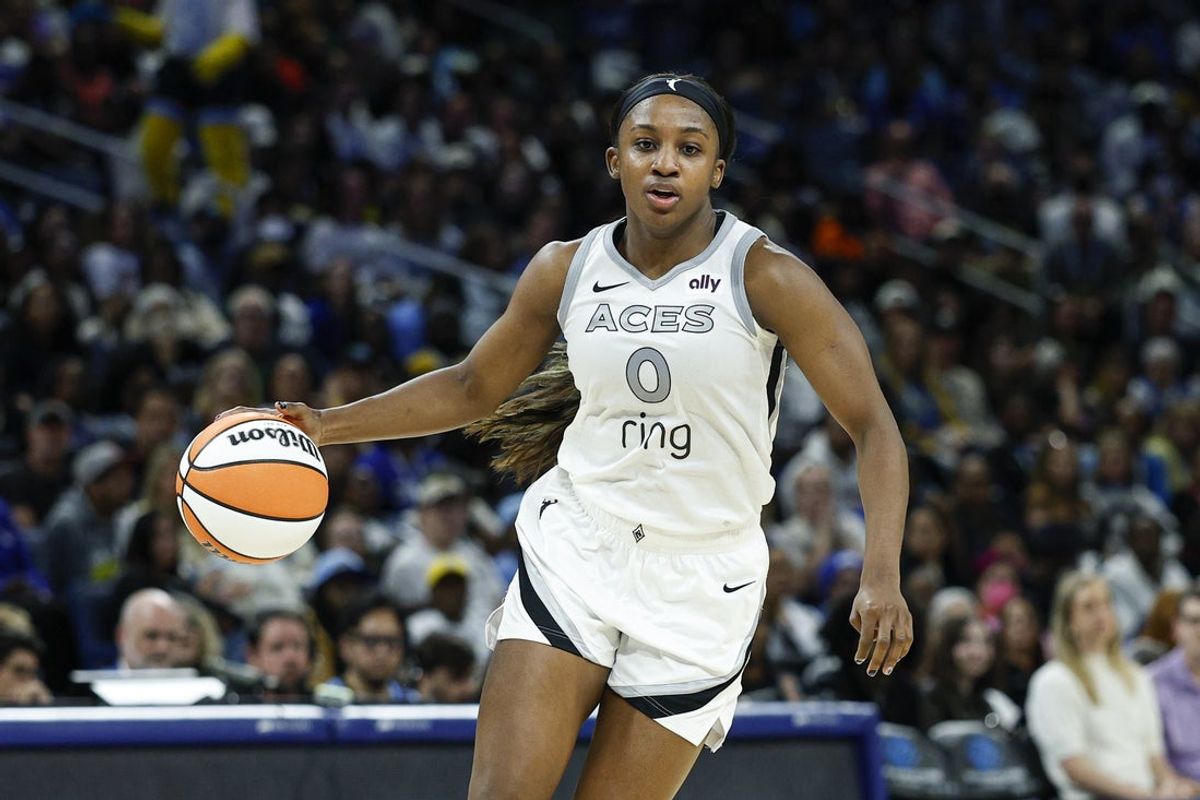 Aug 25, 2025; Chicago, Illinois, USA; Las Vegas Aces guard Jackie Young (0) drives to the basket against the Chicago Sky during the second half at Wintrust Arena. Mandatory Credit: Kamil Krzaczynski-Imagn Images
