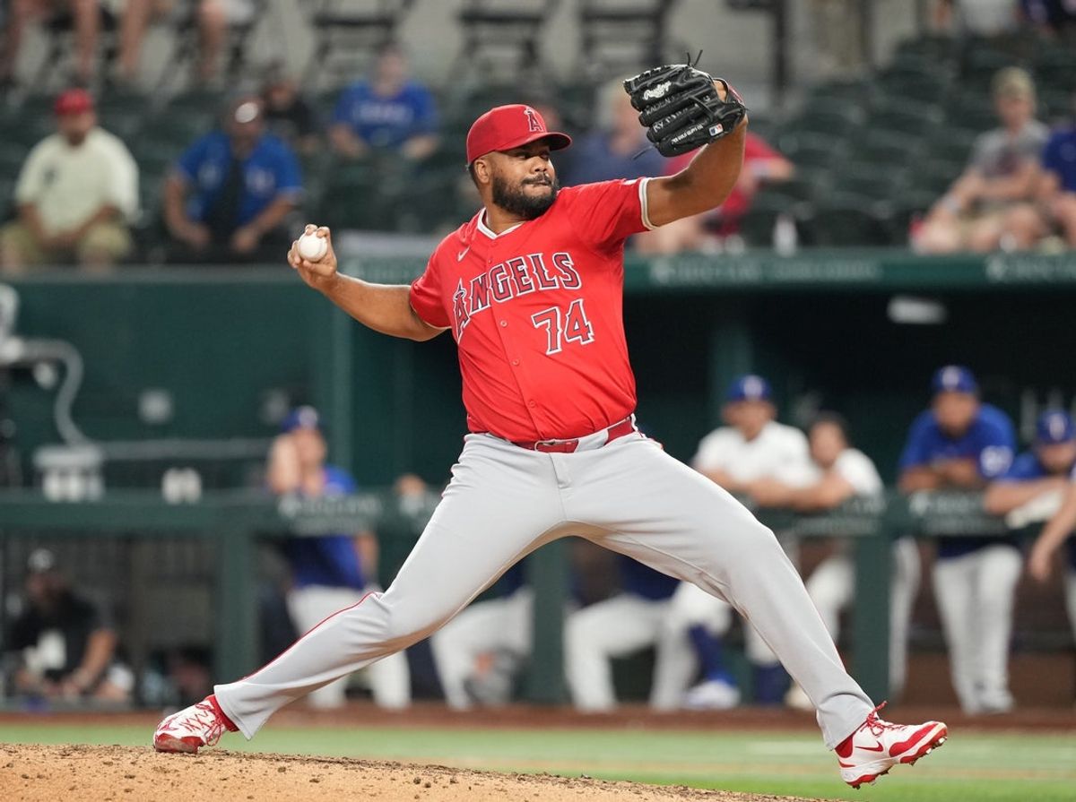 Aug 25, 2025; Arlington, Texas, USA; Los Angeles Angels relief pitcher Kenley Jansen (74) delivers a pitch to the Texas Rangers during the ninth inning at Globe Life Field. Mandatory Credit: Jim Cowsert-Imagn Images
