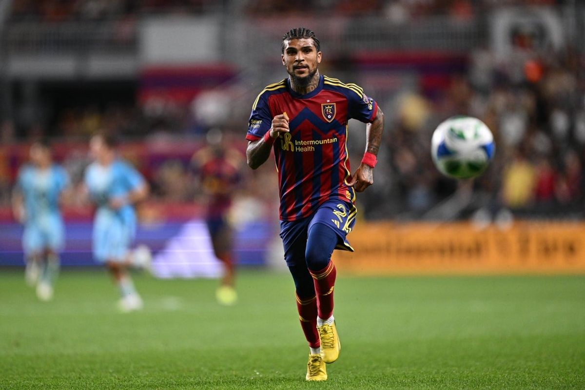 Aug 23, 2025; Sandy, Utah, USA;  Real Salt Lake defender DeAndre Yedlin (2) controls the ball against Minnesota United at America First Field. Mandatory Credit: Jamie Sabau-Imagn Images