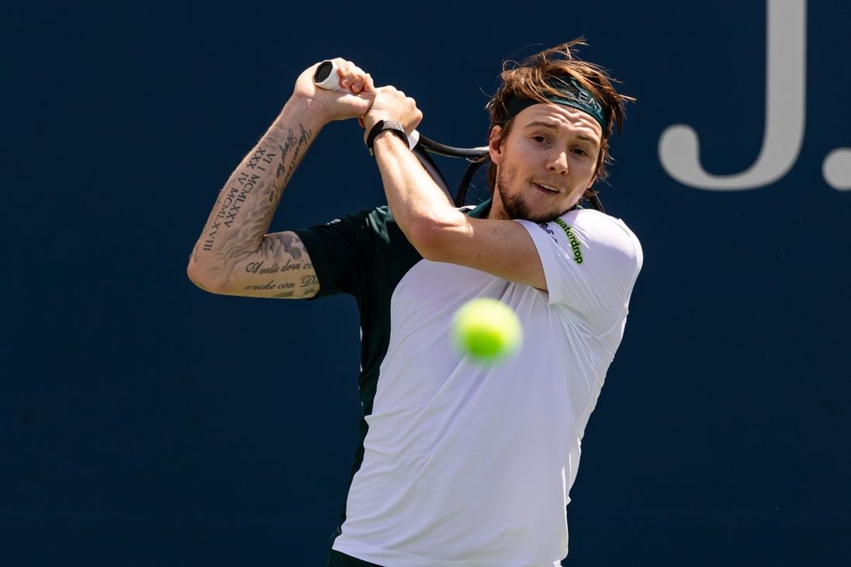 Aug 26, 2025; Flushing, NY, USA; Alexander Bublik of Kazakhstan in action against Marin Cilic of Croatia in the first round of the menís singles at the US Open at Billie Jean King National Tennis Centre. Mandatory Credit: Mike Frey-Imagn Images