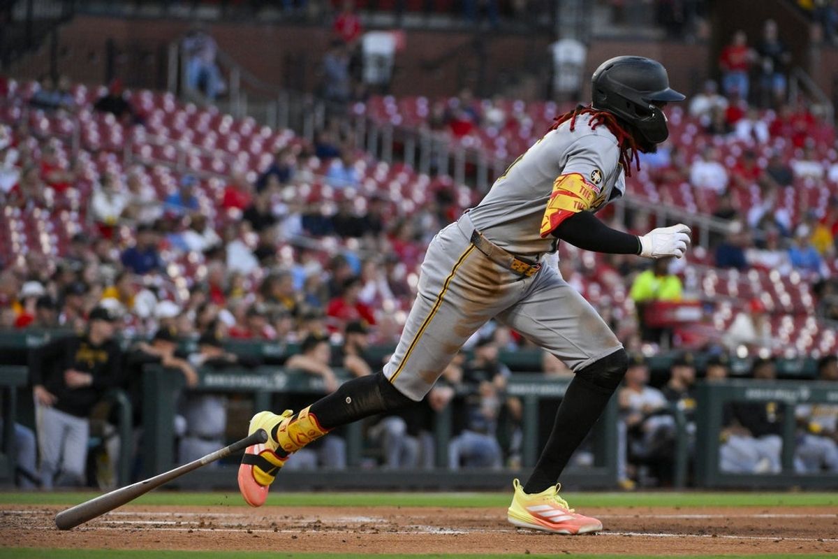 Aug 26, 2025; St. Louis, Missouri, USA;  Pittsburgh Pirates center fielder Oneil Cruz (15) drives in a run as he grounds out against the St. Louis Cardinals during the second inning at Busch Stadium. Mandatory Credit: Jeff Curry-Imagn Images