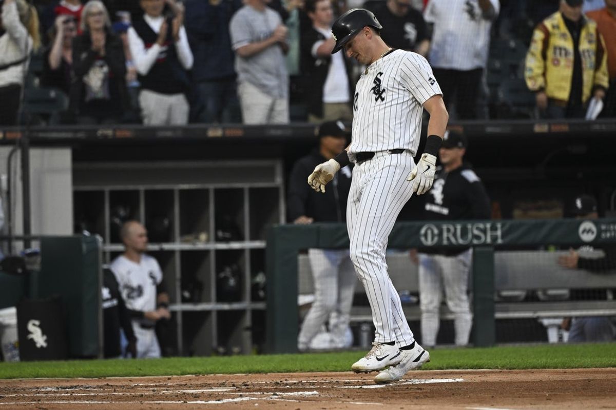 Aug 26, 2025; Chicago, Illinois, USA; Chicago White Sox shortstop Colson Montgomery (12) crosses home plate after hitting a home run during the second inning against the Kansas City Royals at Rate Field. Mandatory Credit: Matt Marton-Imagn Images