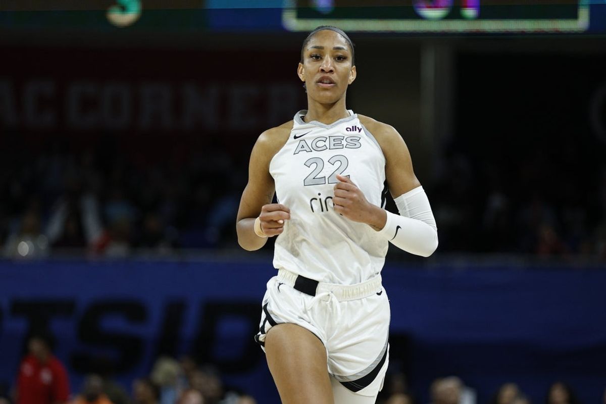 Aug 25, 2025; Chicago, Illinois, USA; Las Vegas Aces center A'ja Wilson (22) runs on the court during the second half of a WNBA game against the Chicago Sky at Wintrust Arena. Mandatory Credit: Kamil Krzaczynski-Imagn Images