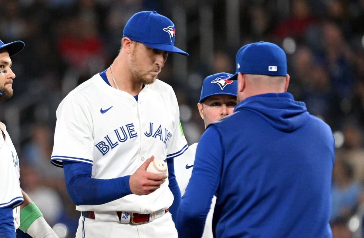 Aug 26, 2025; Toronto, Ontario, CAN;  Toronto Blue Jays relief pitcher Jeff Hoffman (23) is relieved by manager John Schneider (14) in the ninth inning against the Minnesota Twins at Rogers Centre. Mandatory Credit: Dan Hamilton-Imagn Images